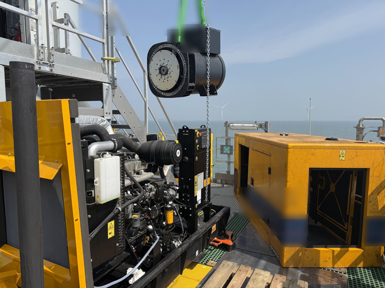 Alternator being craned in during an offshore generator repair